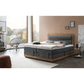 Das Boxspringbett setzt auf eine Farbgebung in Anthrazit